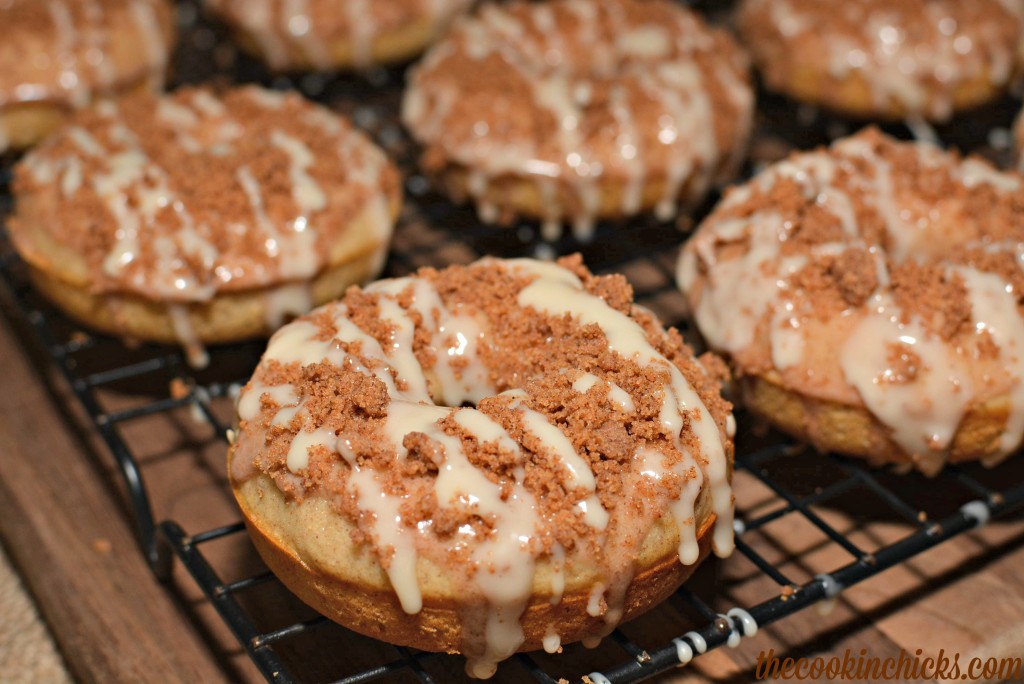 cinnamon coffee cake crumble on top of a flavorful baked donut