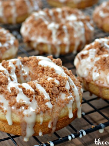 baked donuts with a cinnamon stresuel and powdered glaze