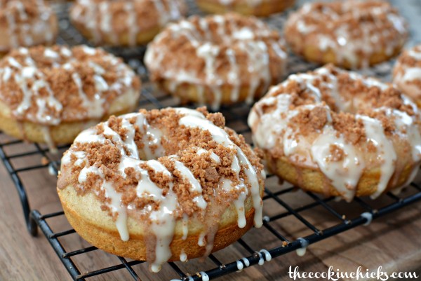 fluffy baked donuts with a cinnamon crumble and sweet glaze on top