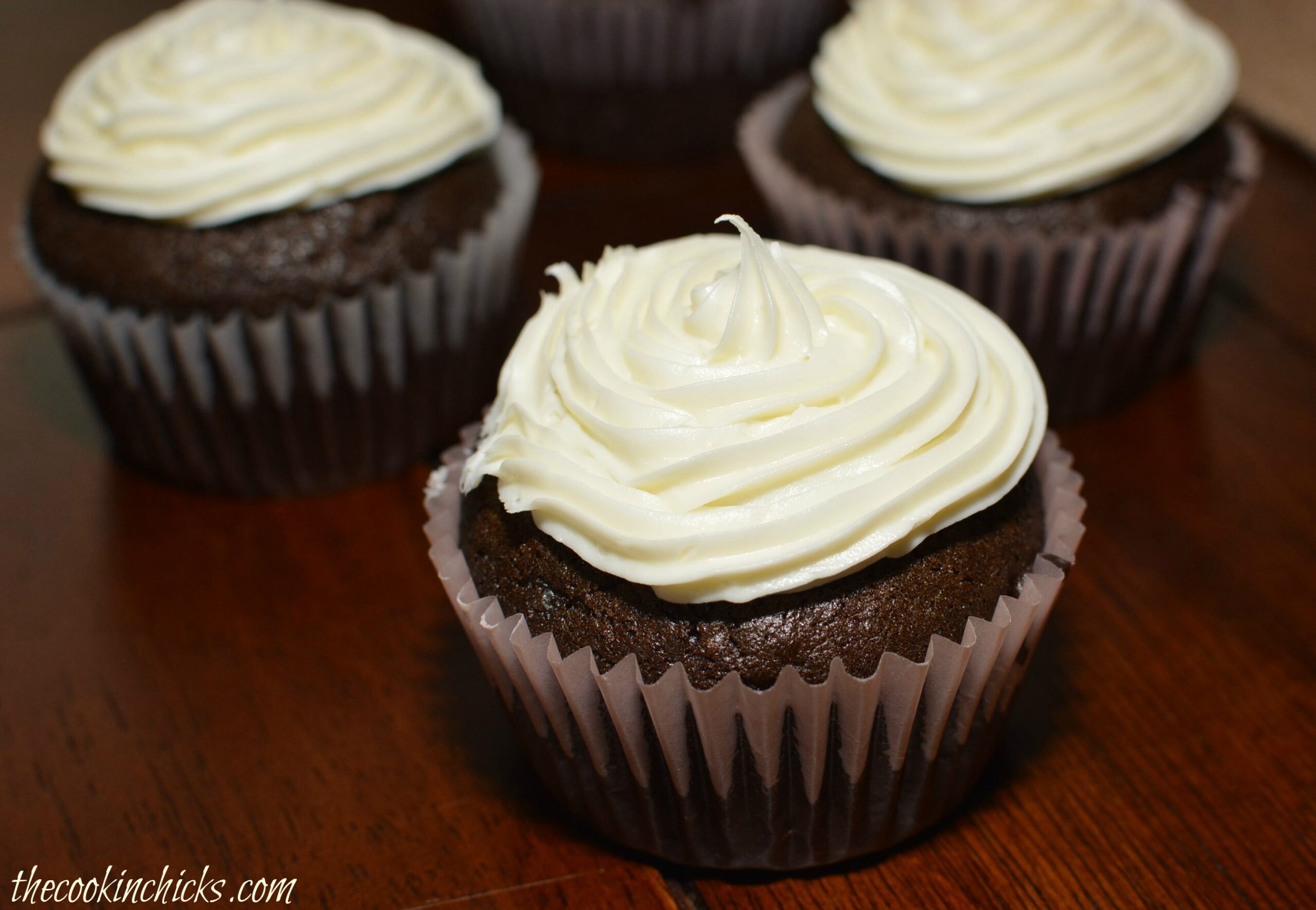 a chocolate mayonnaise cupcake with vanilla frosting.