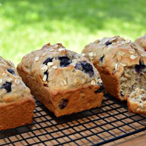 flavorful lemon bread with blueberries and oats throughout