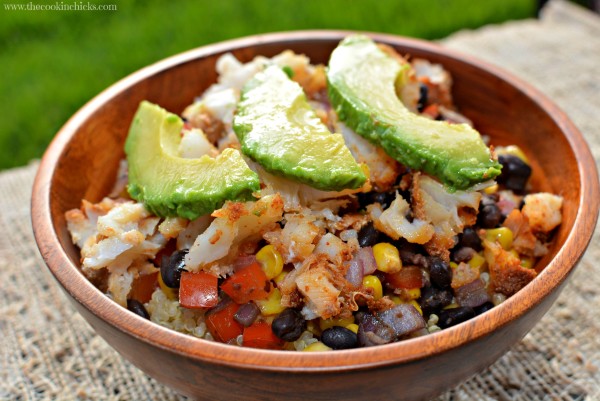 flaky white fish combined with rice and toppings for a fish taco bowl