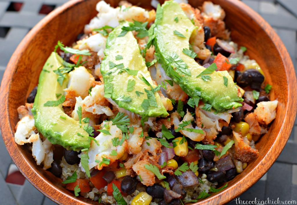 Fish Taco Bowls with beans, rice, corn, avocado, and peppers