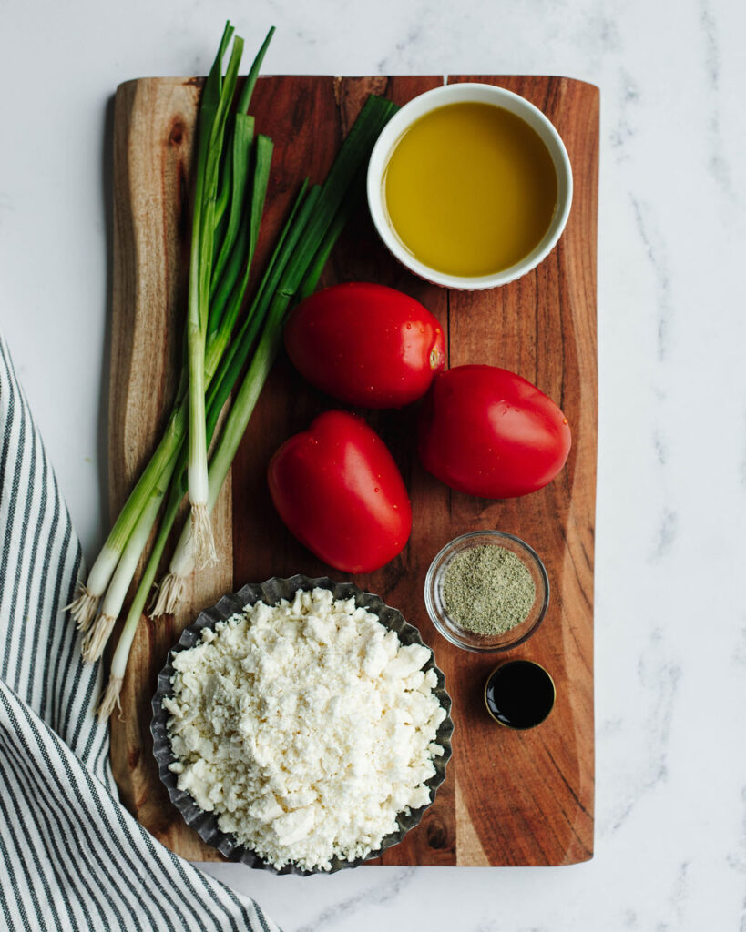 all the ingredients needed to make Tomato Feta Dip.