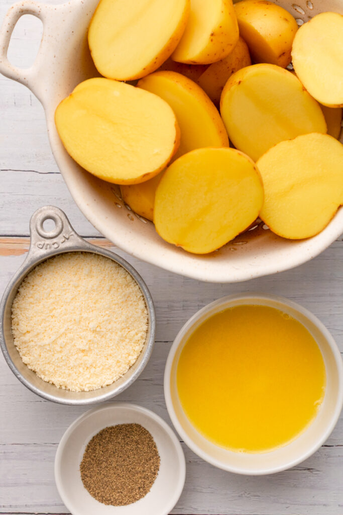 all the ingredients needed to make Parmesan Crusted Potatoes.