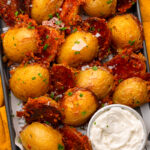 roasted potatoes coated in crispy Parmesan and butter.