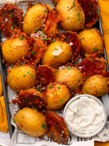 roasted potatoes coated in crispy Parmesan and butter.