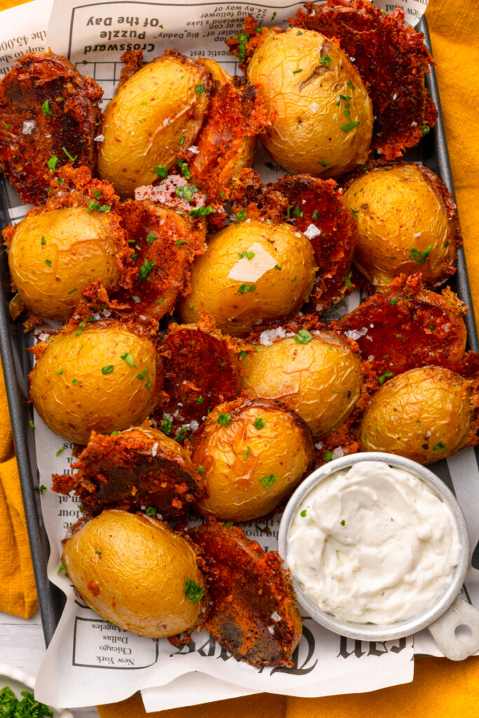 roasted potatoes coated in crispy Parmesan and butter.