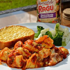 cheesy tortellini with spaghetti sauce, italian sausage, and cheeses cooked in the crockpot