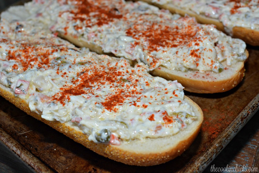 mayonnaise and Italian olive salad combined and spread onto French bread, then baked