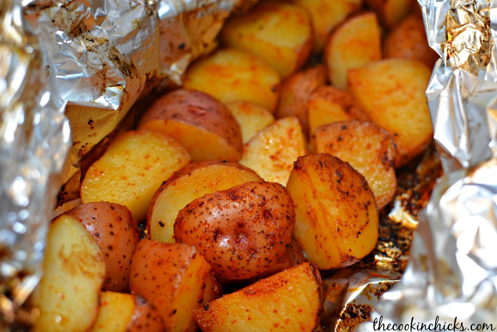 seasoned potato slices cooked in a foil packet on the grill