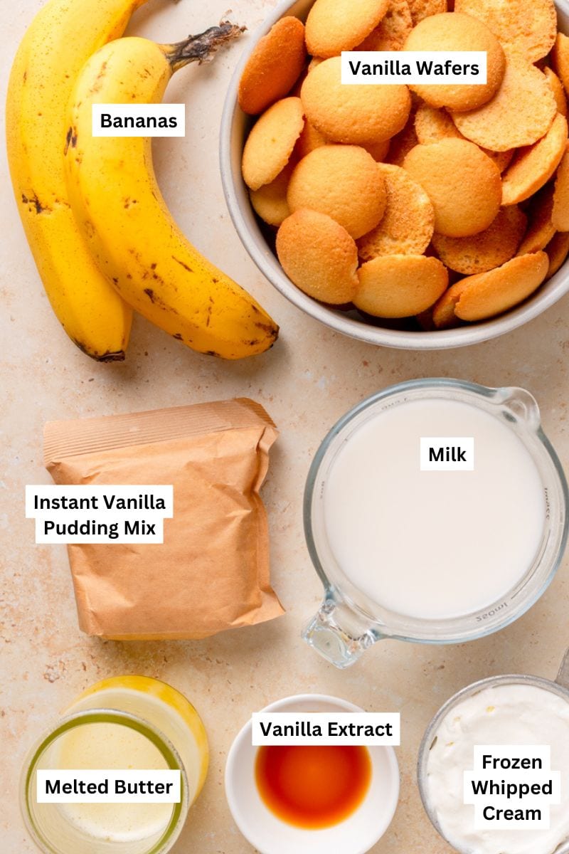 Ingredients for mini banana cream pies including pudding mix, Cool Whip, Nilla Wafers, and fresh bananas.