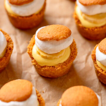 mini banana cream pies on a piece of parchment paper.