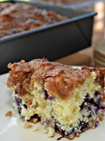 moist, flavorful cake with blueberries throughout and a cinnamon crumb topping