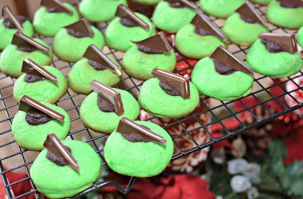 mint sugar cookies with a chocolate ganache filling and mint on top