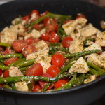 tender chicken, tomatoes, and asparagus in a one pan meal