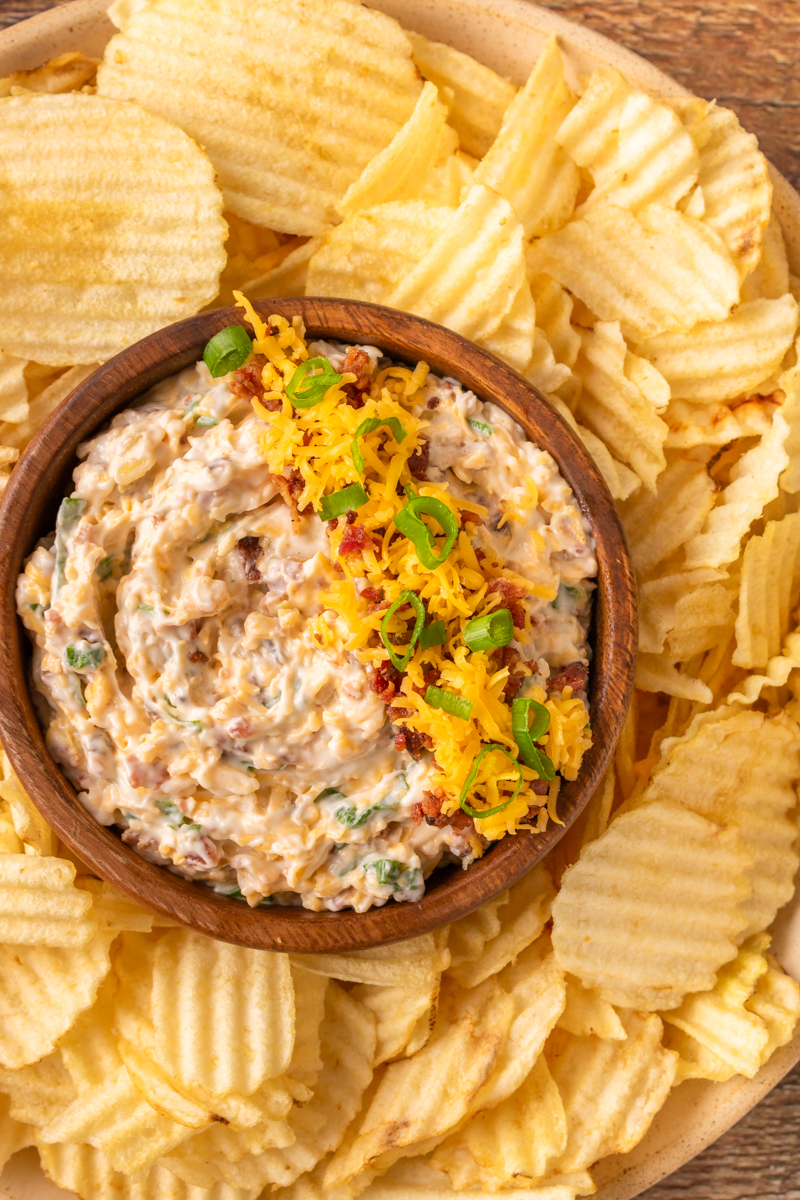 creamy million dollar dip served with potato chips.