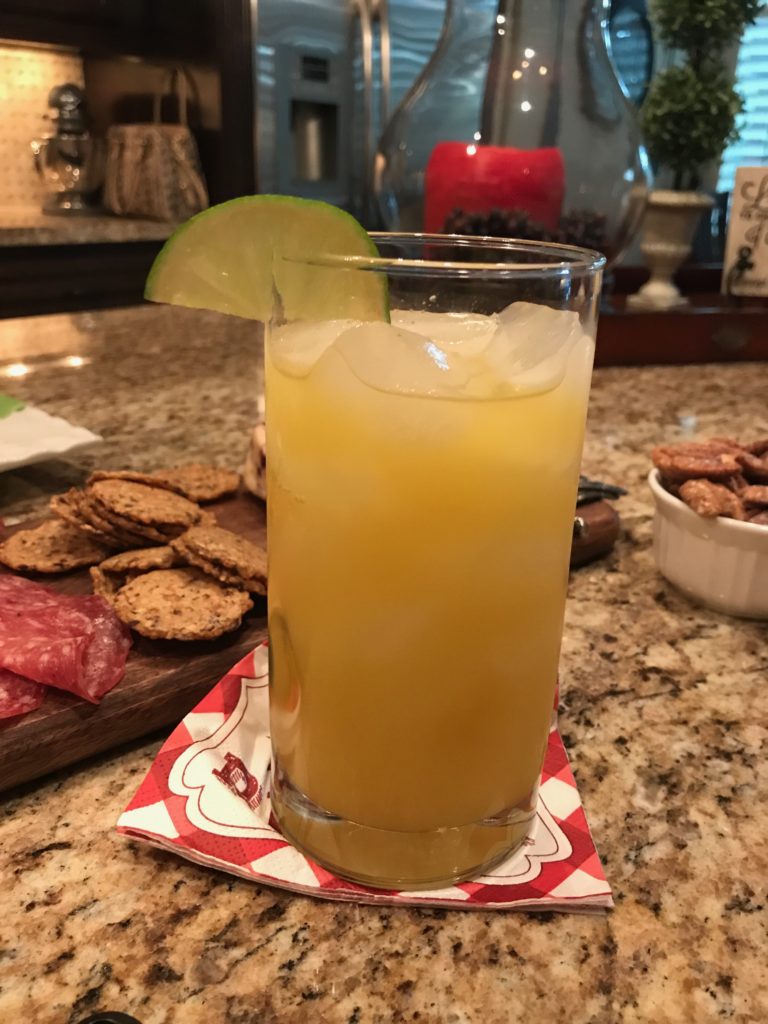 pineapple, orange, and lime juices combined into an adult beverage served at the preakness