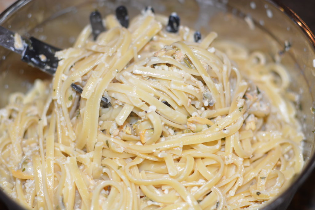 pasta  combined in a white wine garlic sauce