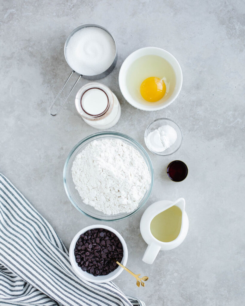 all the ingredients needed to make Mini Chocolate Chip Muffins.