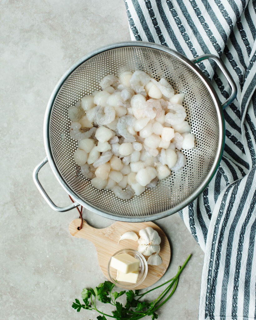 all the ingredients needed to make Garlic Butter Grilled Shrimp and Scallops.