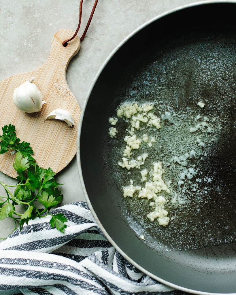 minced garlic in melted butter.