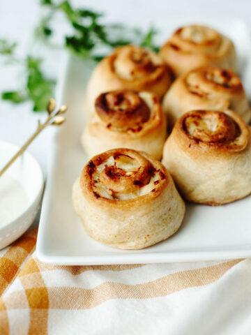 golden brown crescent rolls baked with a chicken cheese mixture inside.