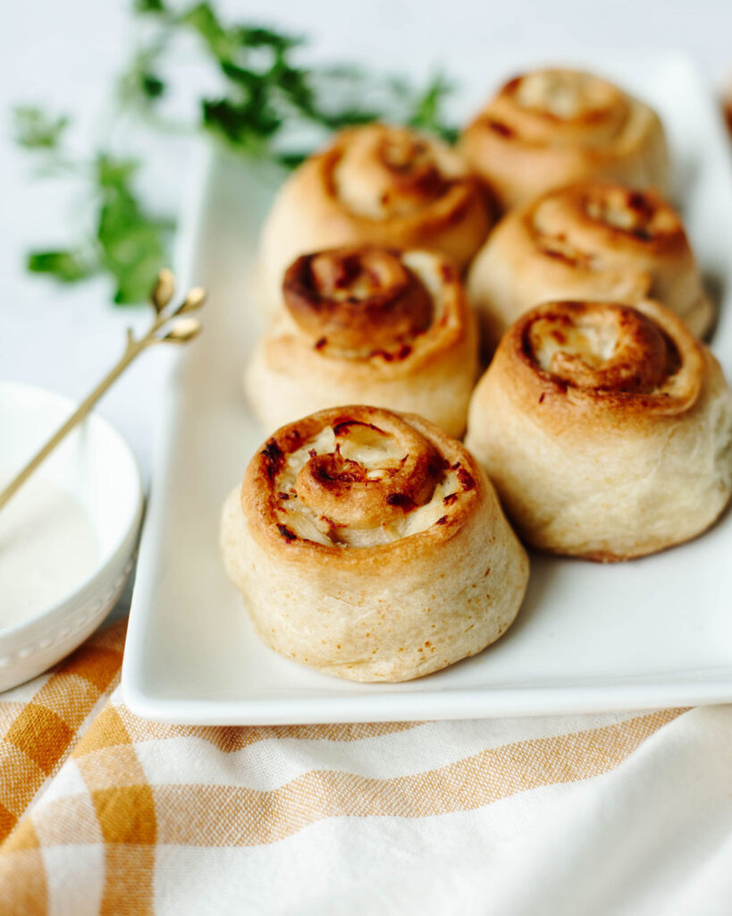 golden brown crescent rolls baked with a chicken cheese mixture inside.