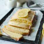sliced lemon loaf on a cutting board.