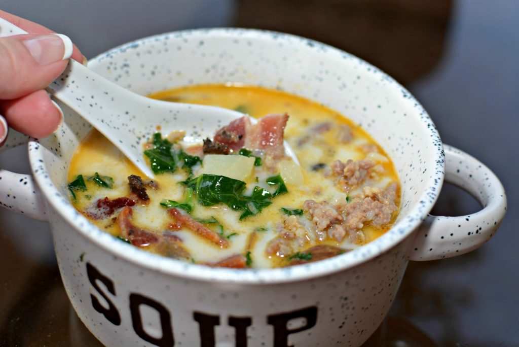 potatoes, kale, spinach, and sausage cooked in the instant pot to form zuppa toscana soup