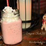 vanilla ice cream, chocolate, and candy cane pieces combined into a tasty milkshake