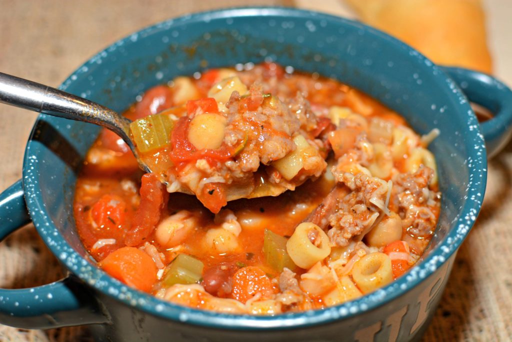 hearty soup with sausage, pasta, beans, and more