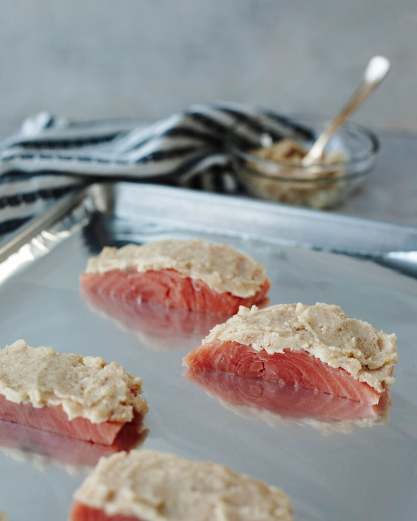 salmon fillets with a simple mayonnaise mixture spread on top.