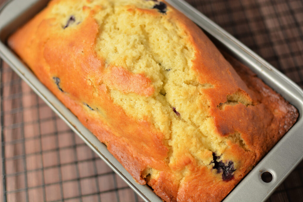 a view of the top of a loaf of blueberry muffin bread