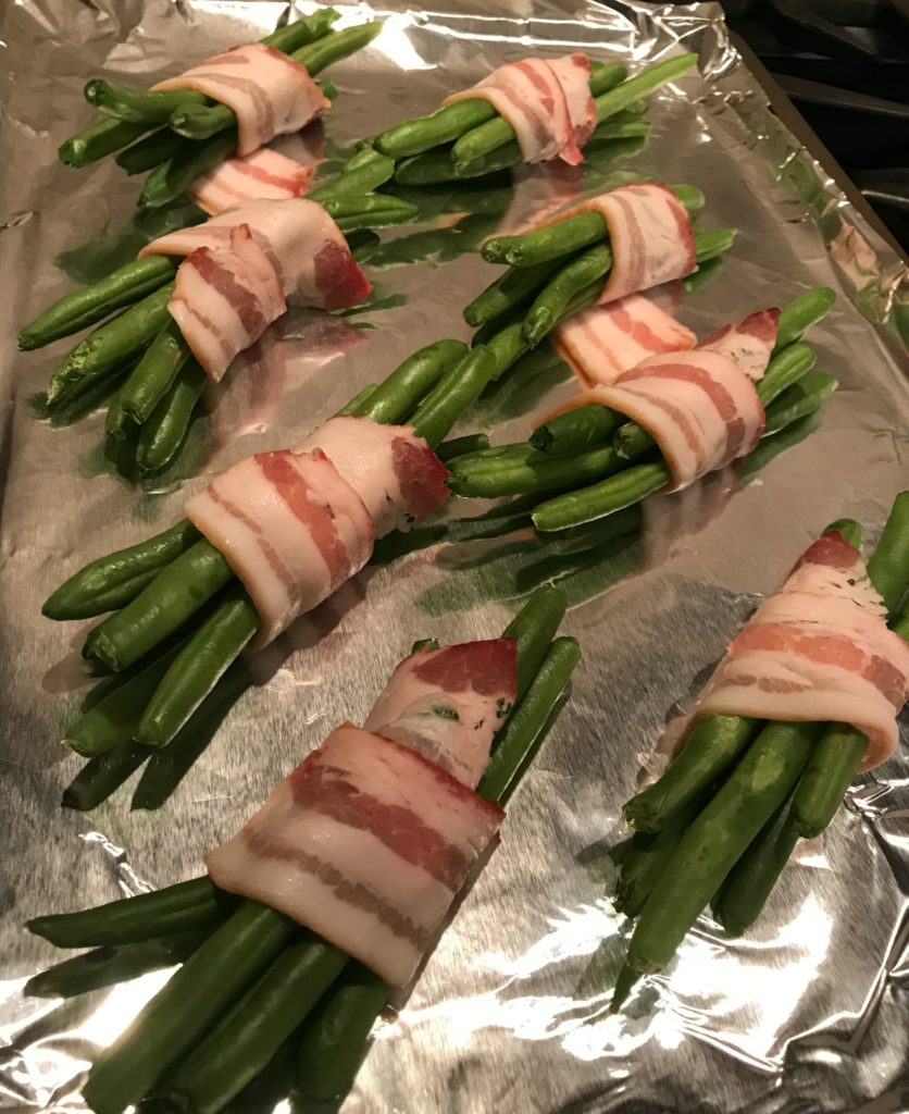 bacon wrapped green beans ready for the oven