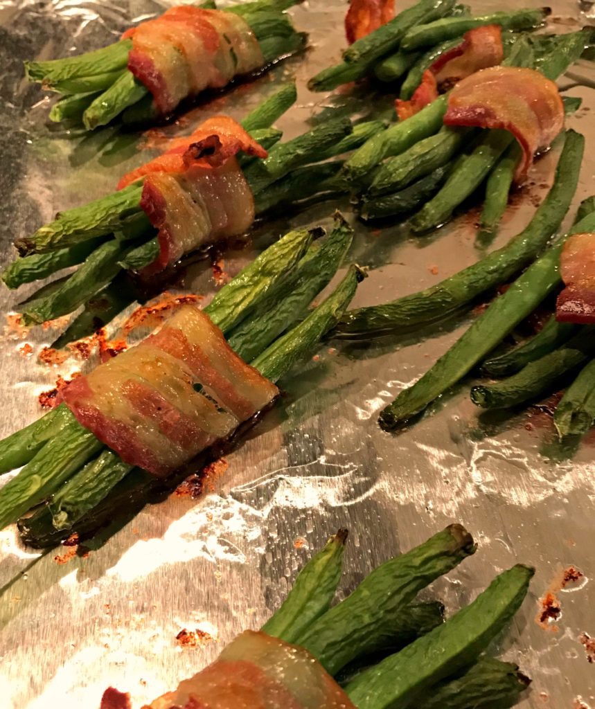 tender greens beans wrapped and cooked in bacon