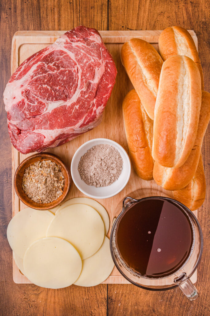 all the ingredients needed to make crockpot french dip sandwiches