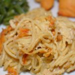 chicken spaghetti that is simple to make and loaded with cheesy flavor throughout