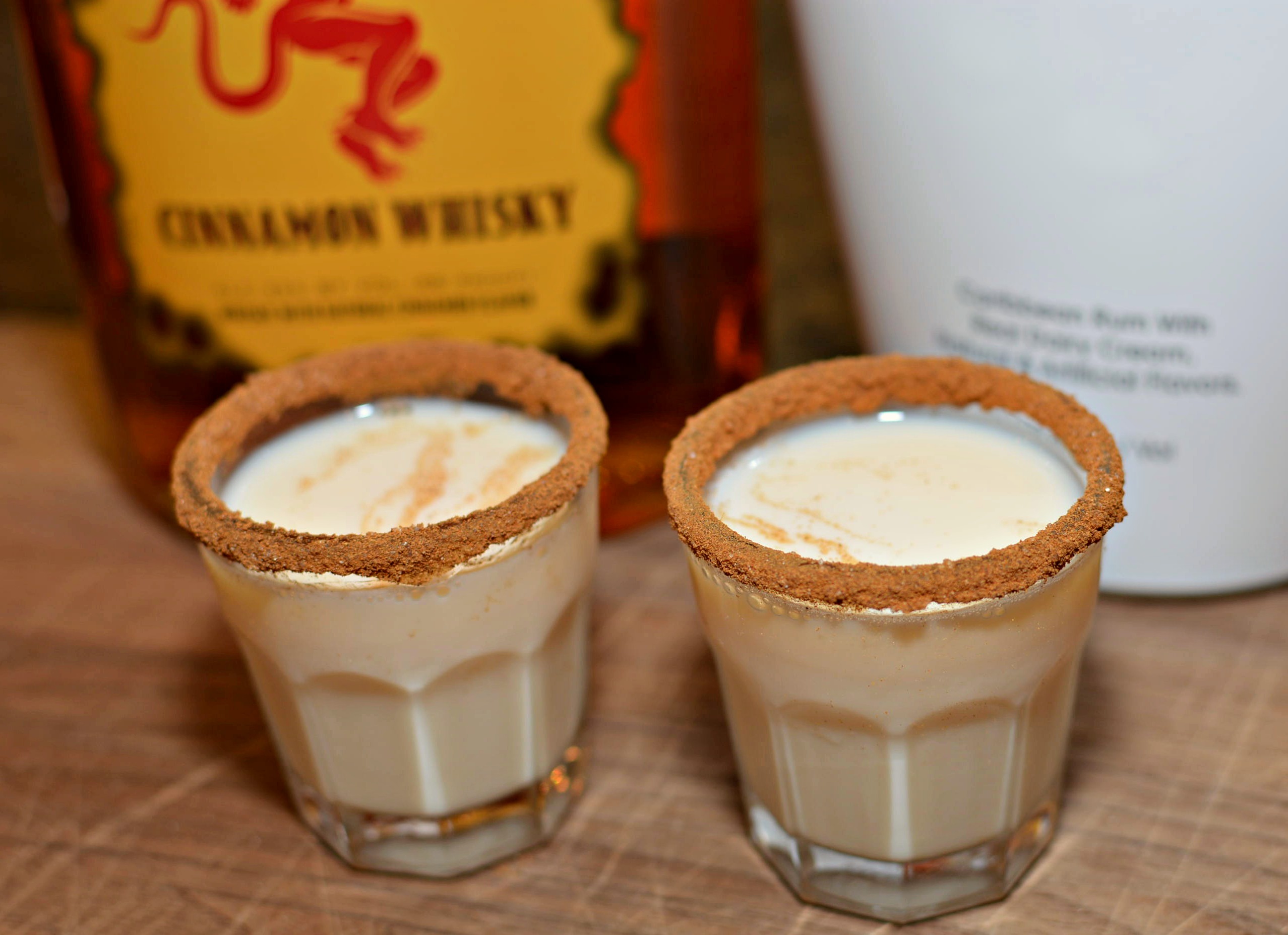 two shots rimmed with cinnamon and sugar and filled with a Rumchata Fireball mixture.