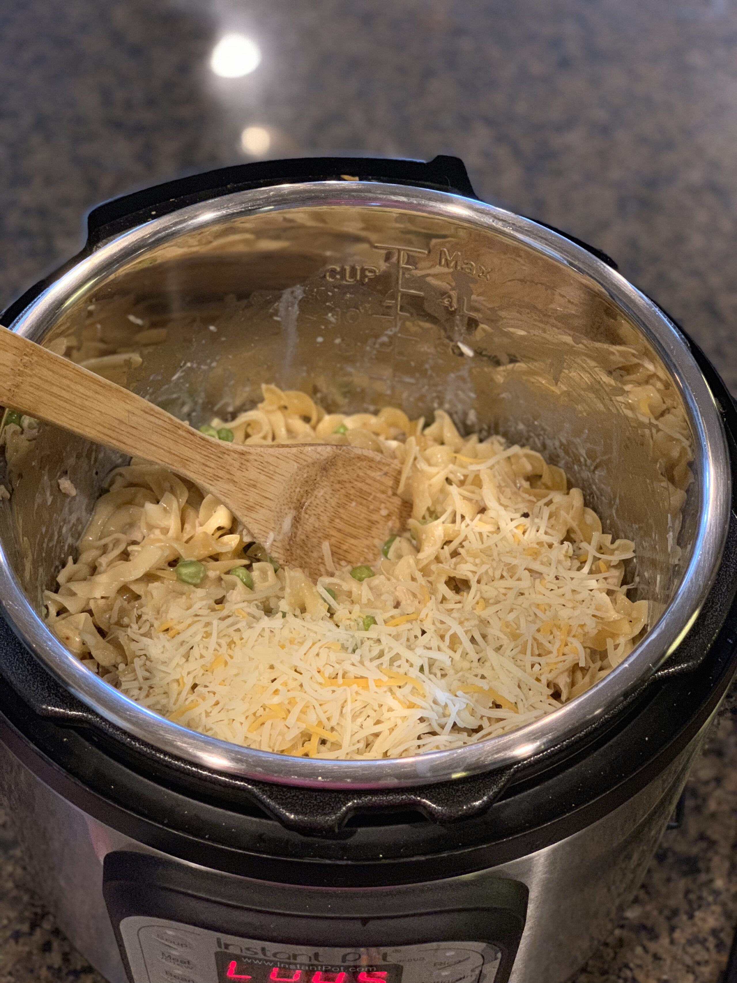 cheesy pasta with tuna throughout cooked in the instant pot