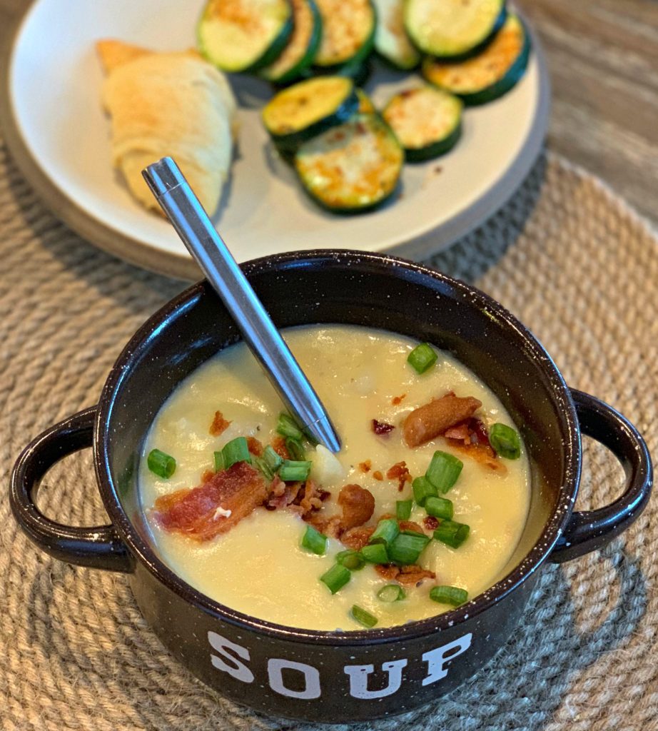 loaded potato soup served with zucchini and crescent rolls