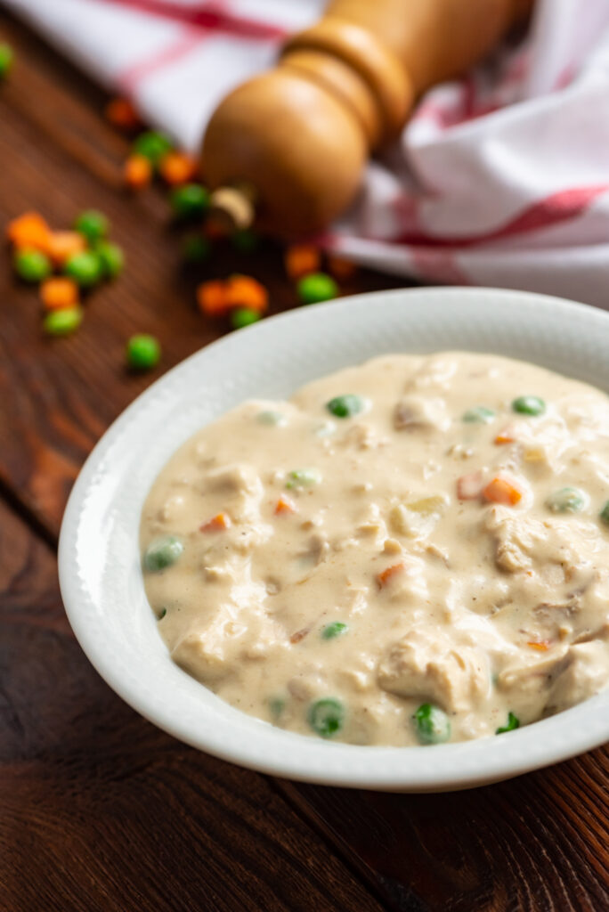 moms chicken pot pie soup is creamy and flavorful with chicken and veggies throughout