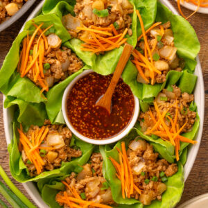 a serving tray full of lettuce wraps ready to eat.