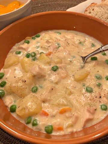 tender chicken and veggies in a flavorful cream based soup