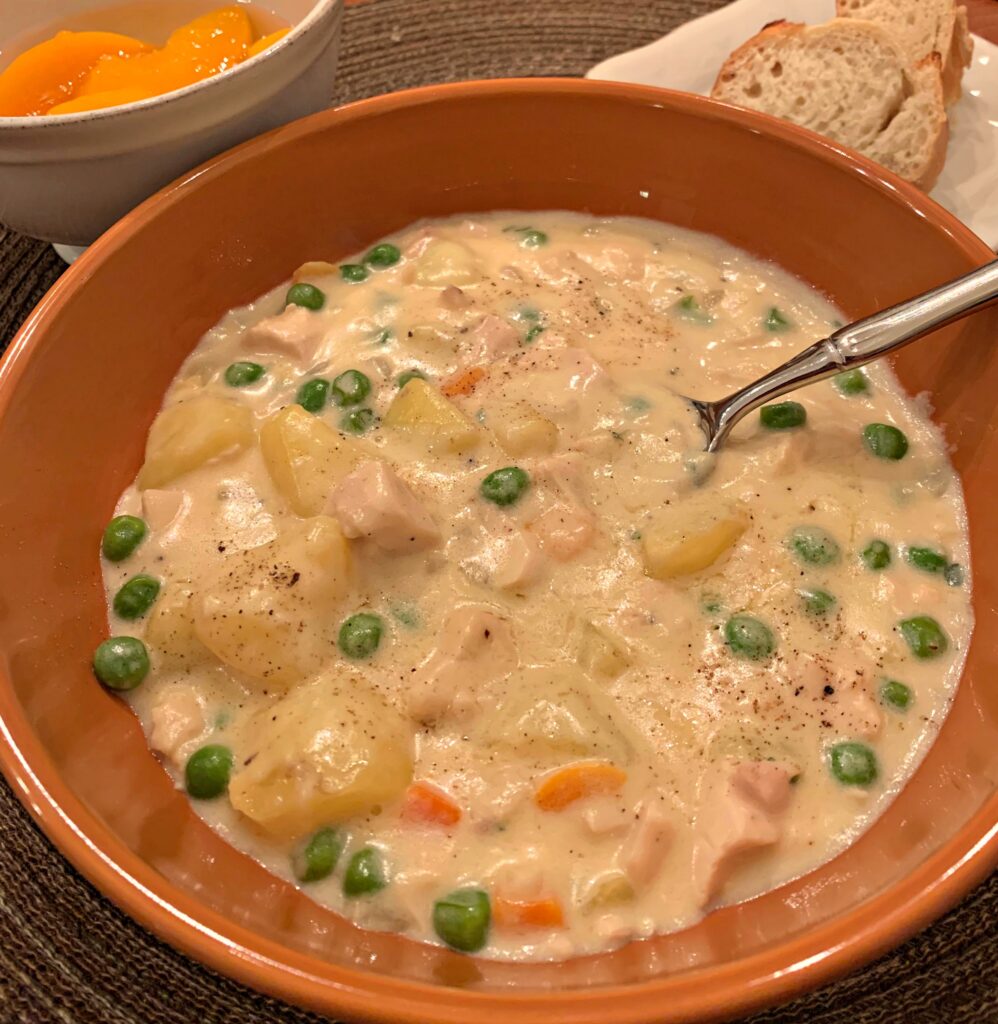 creamy soup with tender chicken and veggies throughout