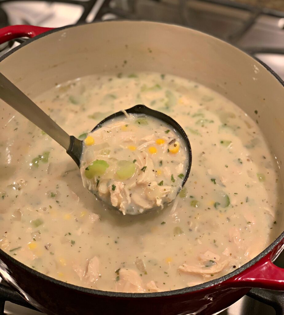 creamy soup with chicken and rice in a savory broth