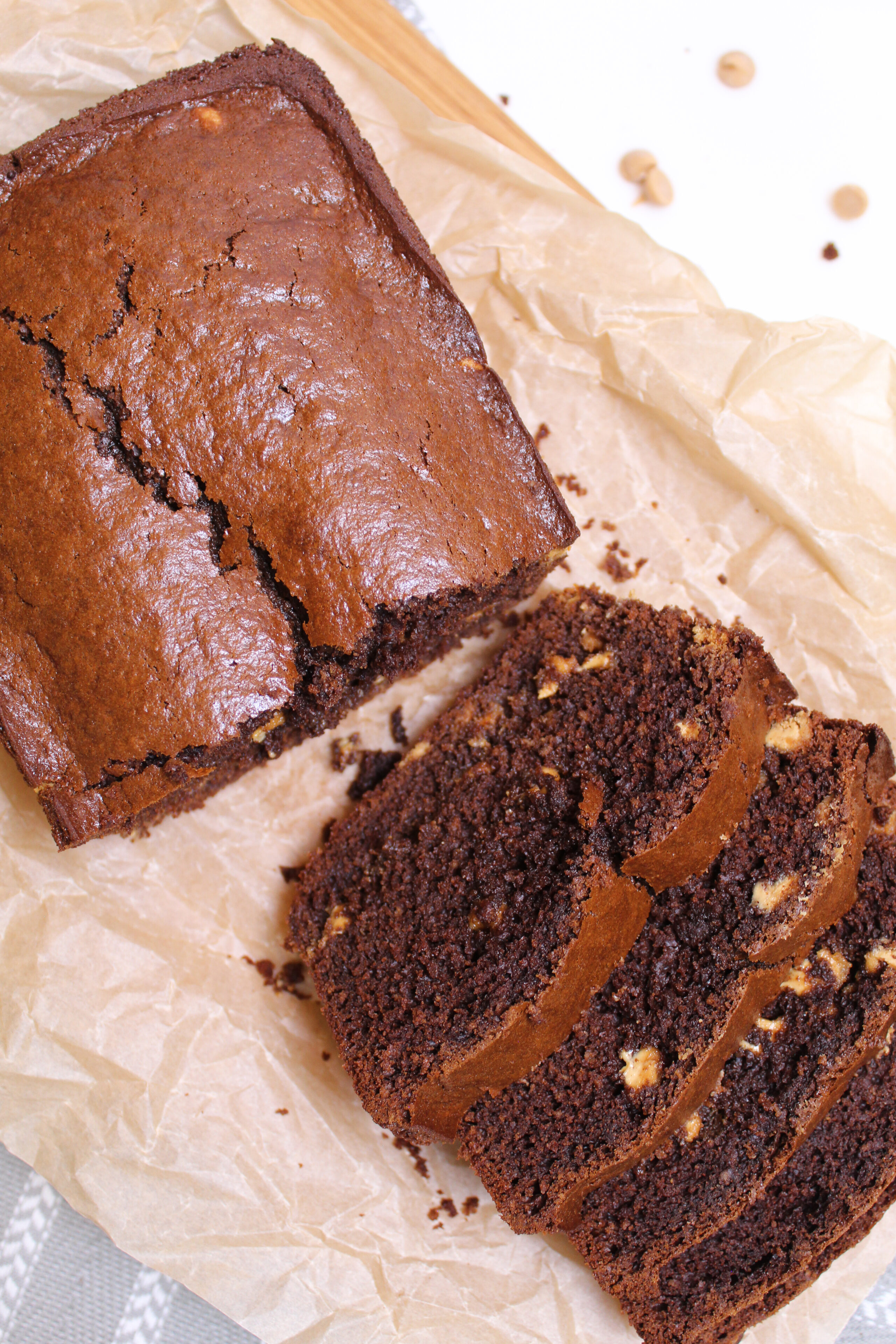 a chocolate peanut butter quick bread sliced and ready to serve.