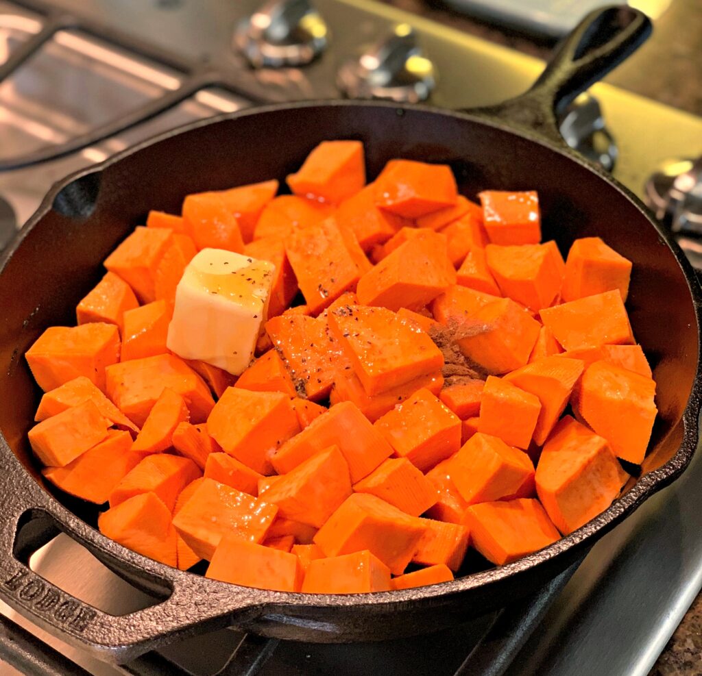 diced sweet potatoes with honey, cinnamon, and butter coated on every piece