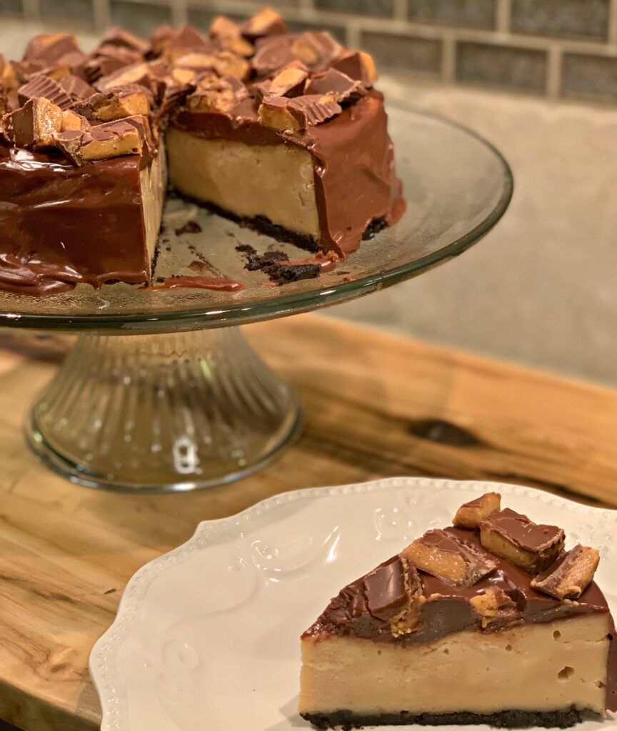 a slice of chocolate peanut butter cup cheesecake