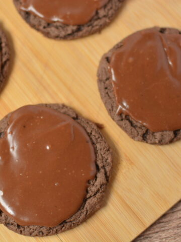 homemade chocolate fudge frosting coating chocolate cake cookies.